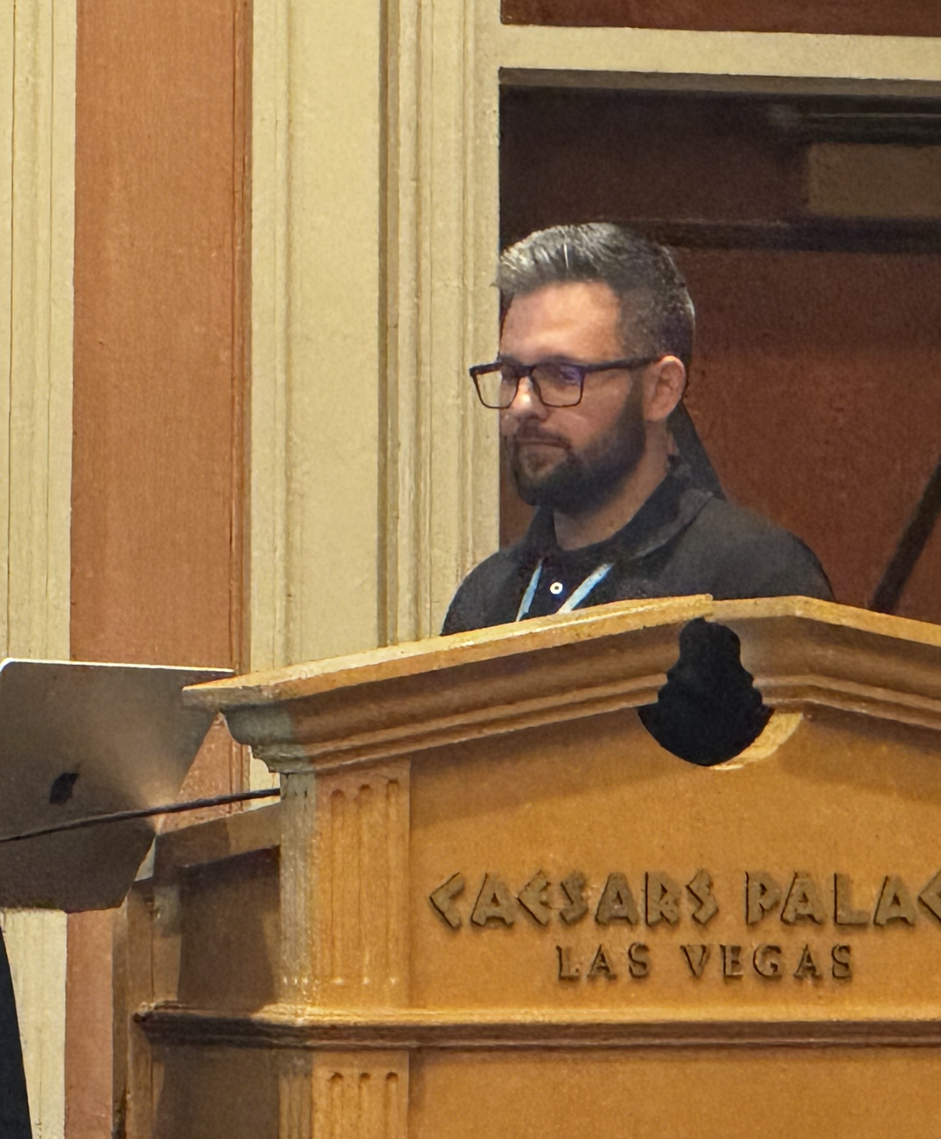 Adrian Besleaga presenting 'Using AI, Expectations vs Reality' in Las Vegas 2025